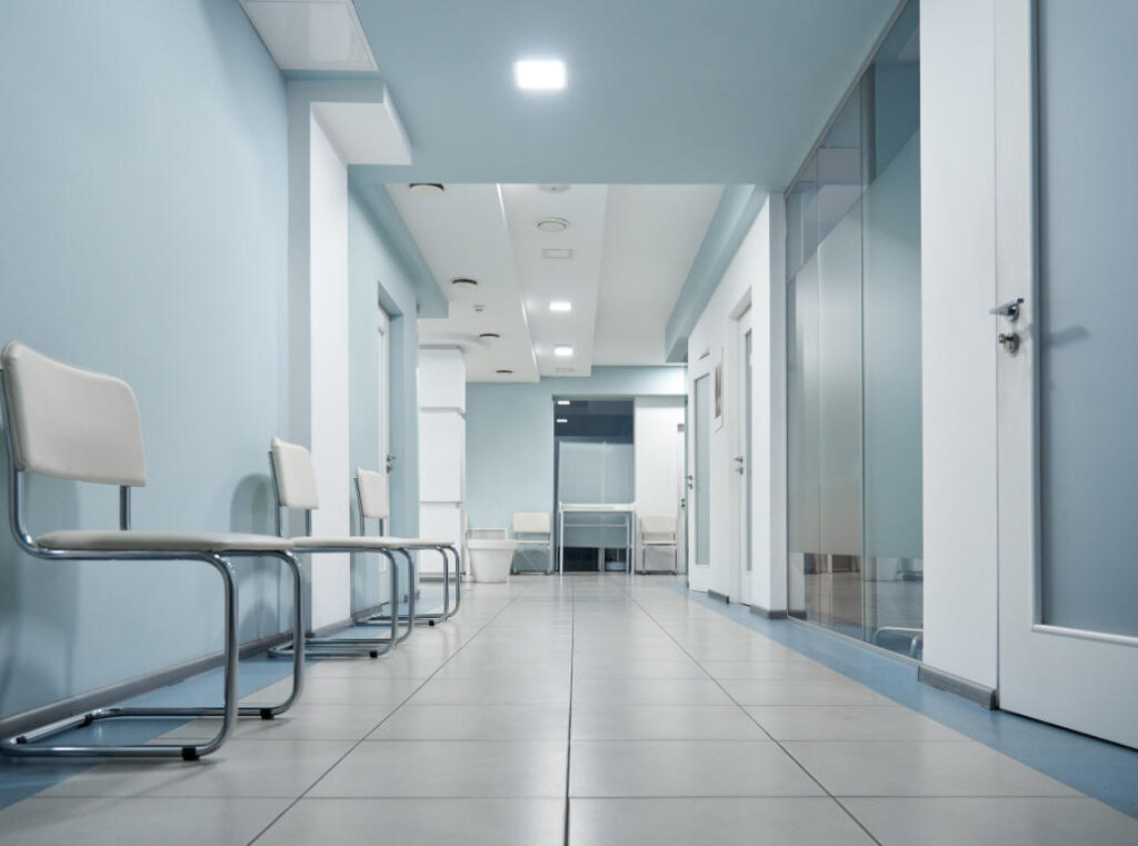 Medical facility corridor painted with specialist low-VOC coatings