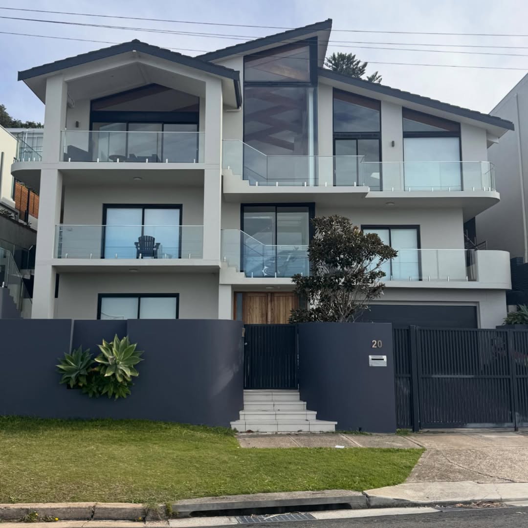 Modern three-storey coastal home with professional exterior painting