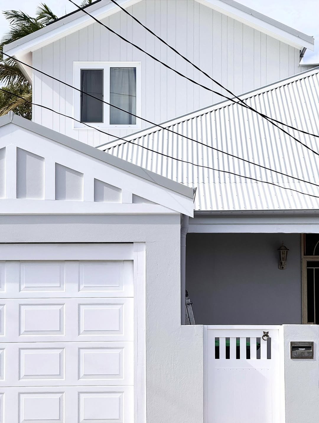 Exterior detail painting on multi-dwelling property