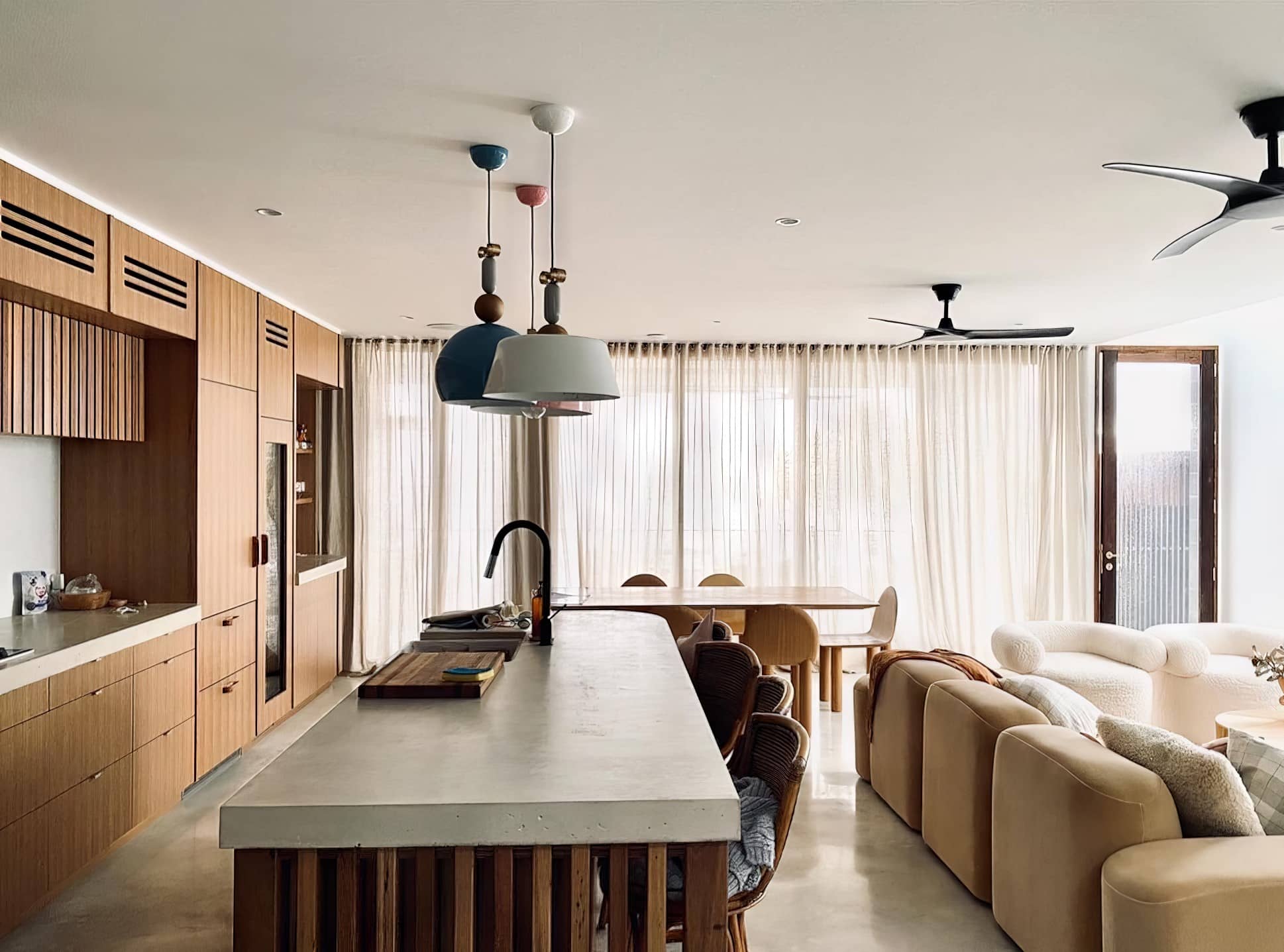 Open plan kitchen and living room interior painting with timber cabinetry
